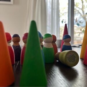 Grimms wooden friends and trees peg dolls in primary color